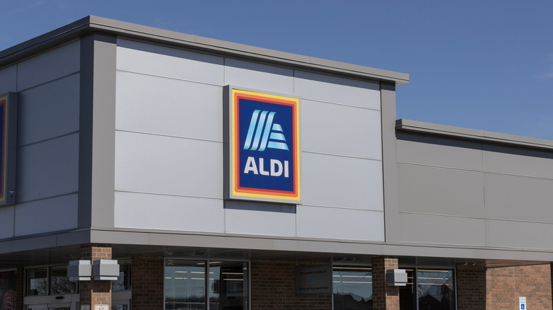 Aldi sign on the exterior wall of the store entrance