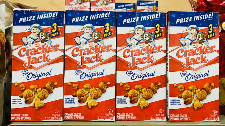 A collection of several boxes of Cracker Jacks in a row.