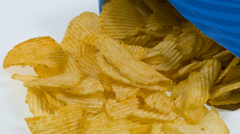 Ruffles Potato Chips spilling out of the bag