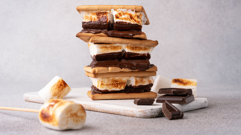 stack of s'mores on a white board
