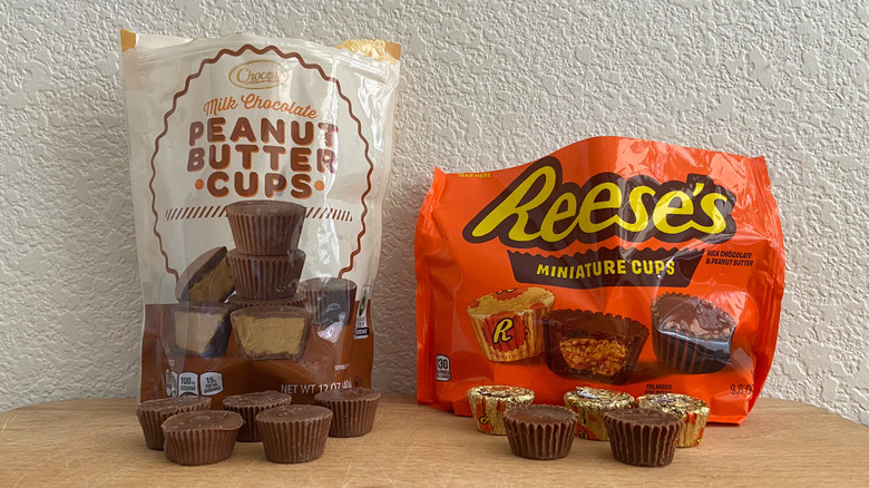 five of each peanut butter cup in front of their respective bags