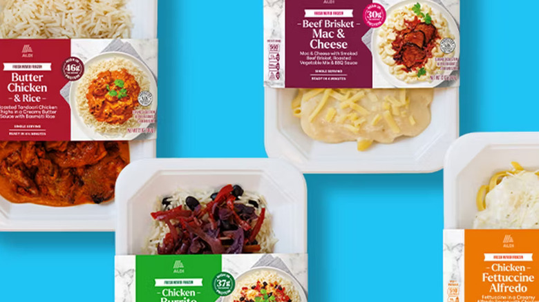Packages of Aldi's new heat and eat products sitting on a blue background.