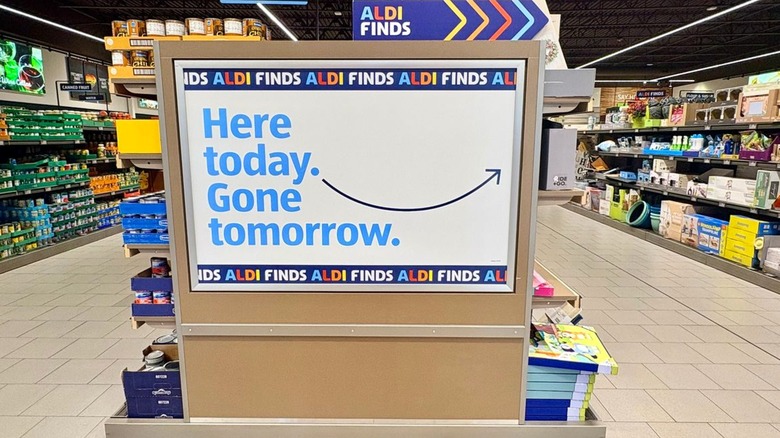 Aldi Finds sign in store in front of aisles of products