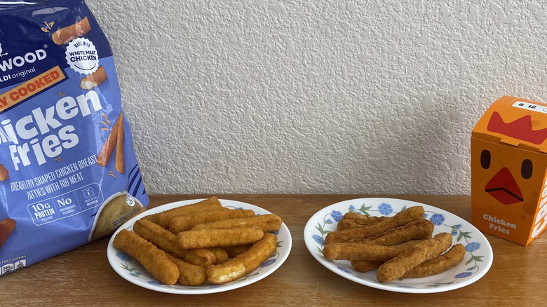 both kinds of Chicken Fries on small plates beside their containers