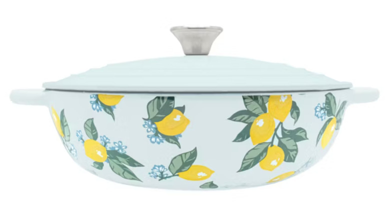 Blue Dutch oven with peppers and tomatoes