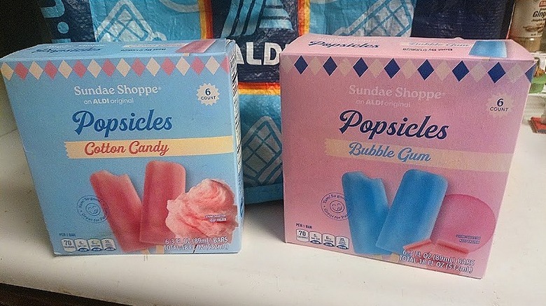 boxes of Sundae Shoppe Cotton Candy and Bubble Gum Popsicles in front of a reusable Aldi shopping bag
