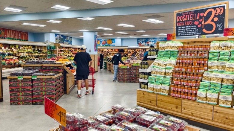 Inside Trader Joe's with view of various aisles and shoppers