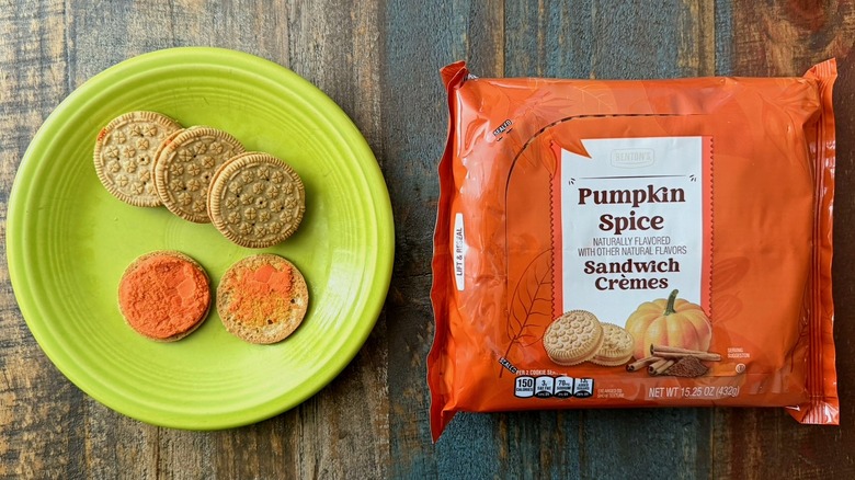 Benton's pumpkin sandwich cremes from Aldi in packaging next to plate with the sandwich cookies