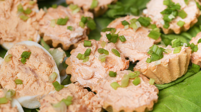 salmon spread in tart shells with green onions