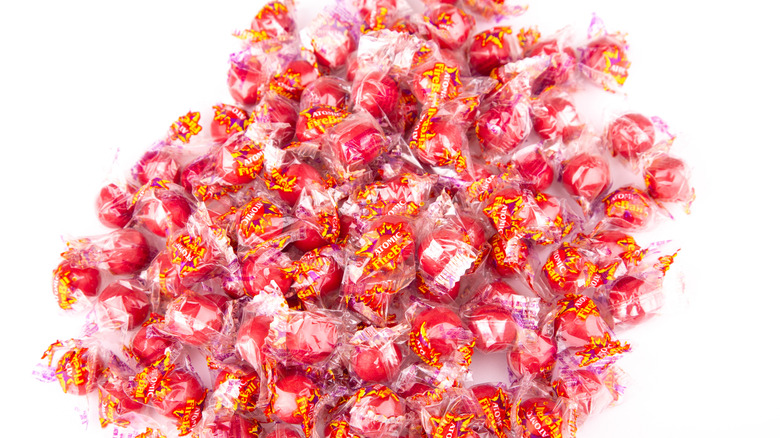 pile of atomic fireball candy on white background