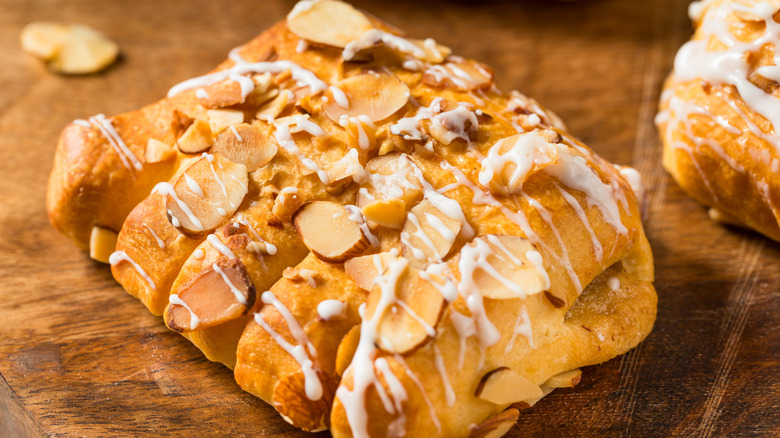 bear claw pastry on a wooden board