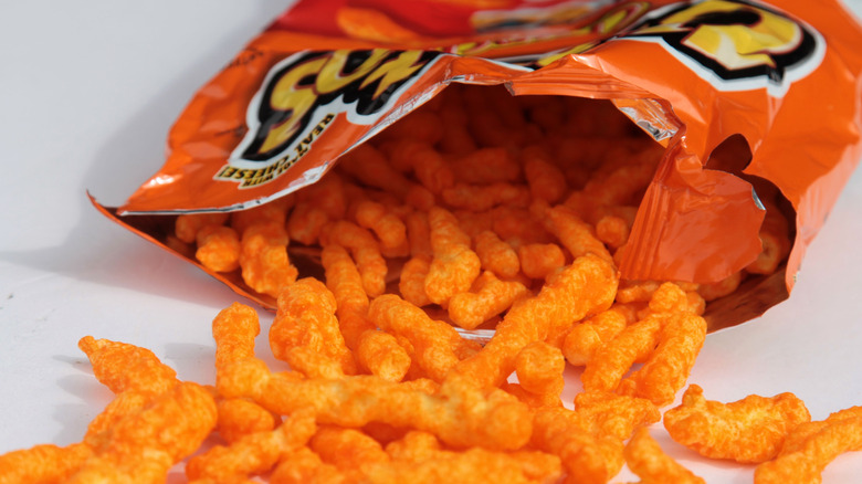 open bag of cheetos spilling out