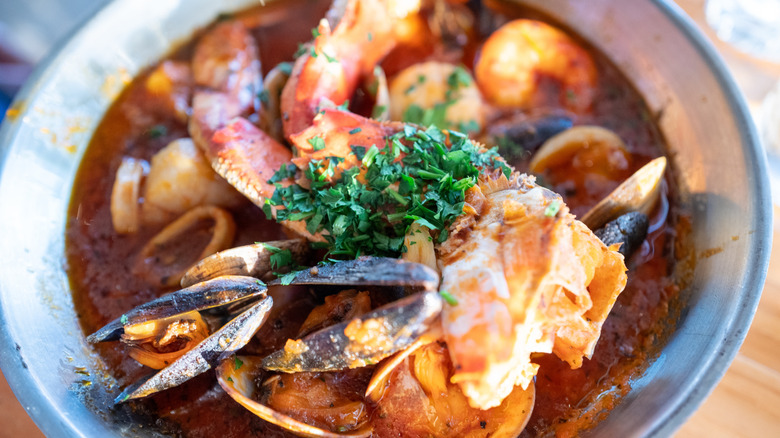 cioppino in a blue-patterned bowl