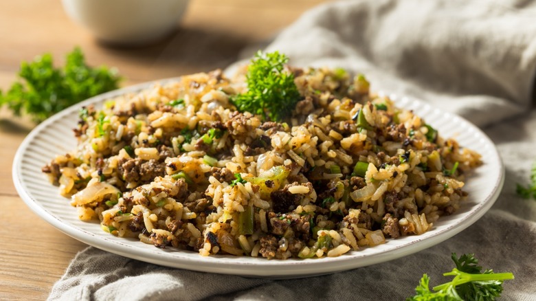 plate of dirty rice with parsley