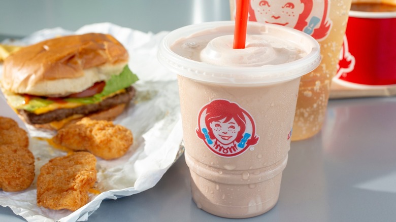 wendy's frosty surrounded by food