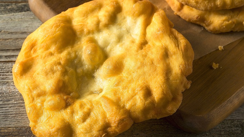 Classic frybread on a wooden serving board