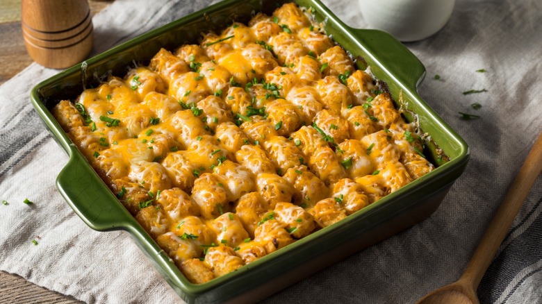cheesy tater tot hot dish casserole in pan