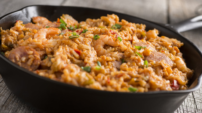 jambalaya with shrimp in a black pan