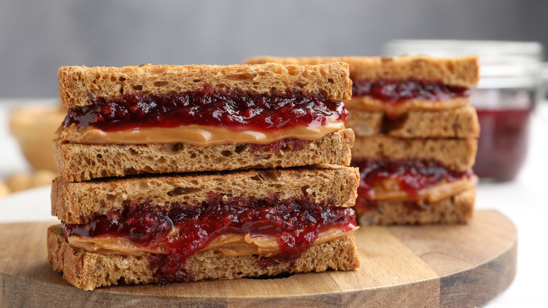 Stacks of peanut butter and jelly sandwiches
