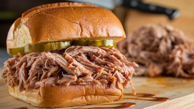 North Carolina-style polled pork ona  bun with a leaf of letuce