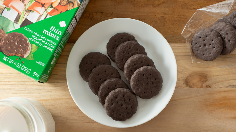 Thin Mints on a plate with girl scout cookie box