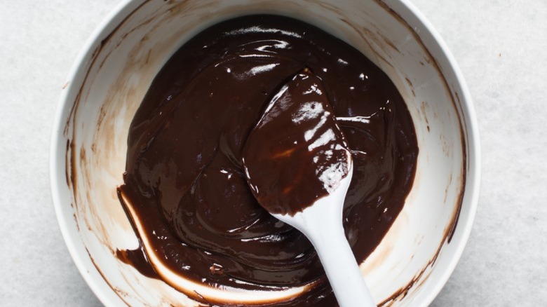 A bowl of dark chocolate ganache.
