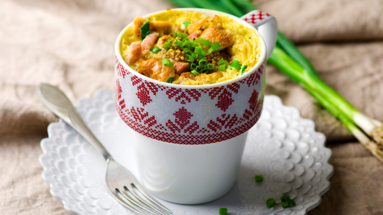 omelet cooked in a mug with chives