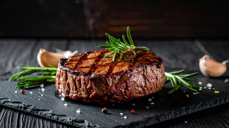 Grilled ribeye steak on slate plate