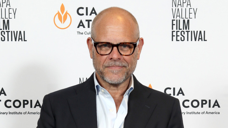 Alton Brown posing at an event