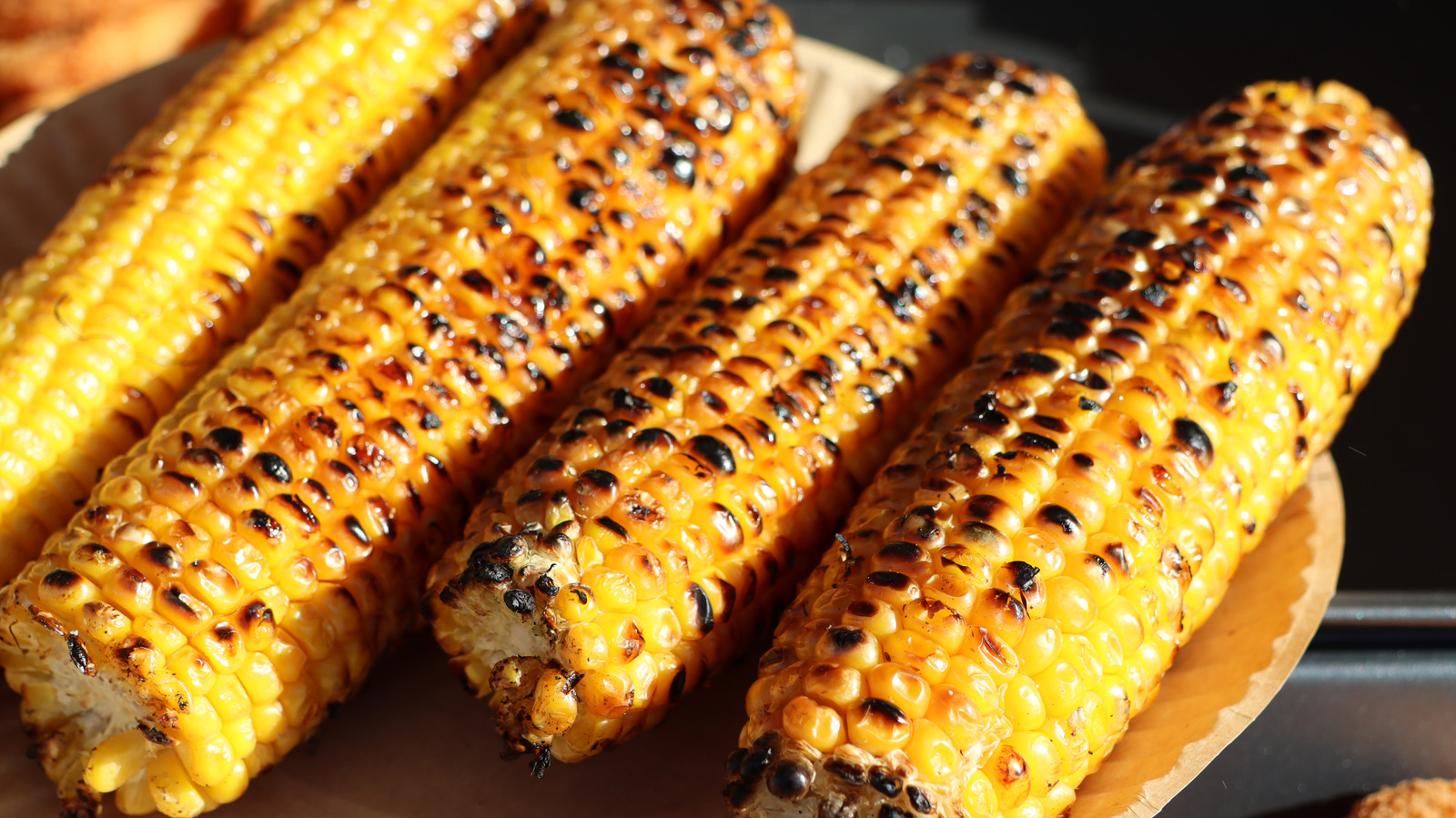 Always Season Your Grilled Corn On The Cob At This Exact Moment