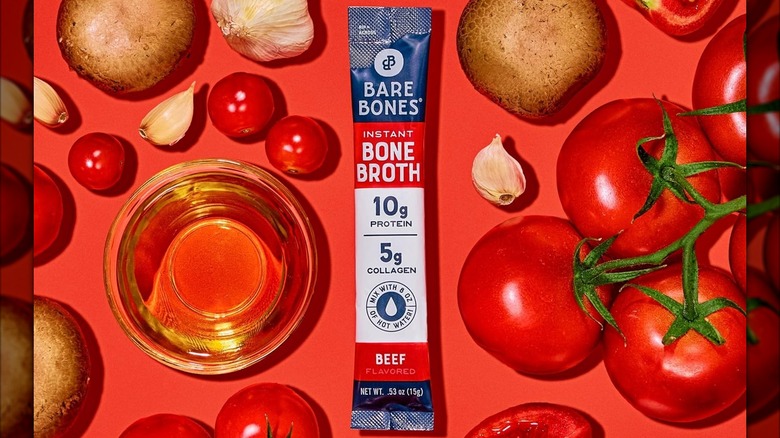 Packet of Bare Bones Bone Broth instant mix with tomatoes, garlic, mushrooms, and olive oil