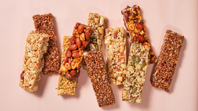 An array of energy bars against a pink background