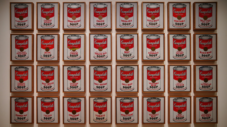 The Andy Warhol Campbell's Soup Cans art piece in a museum