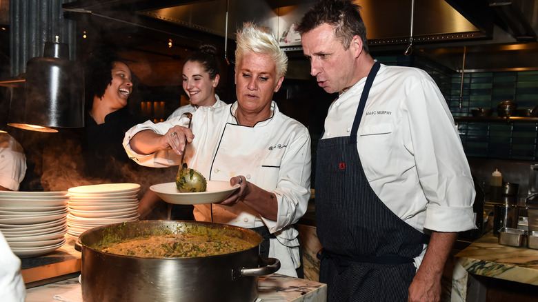 Anne Burrell cooking for an event