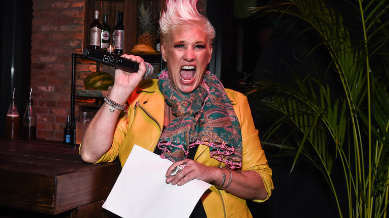 Chef Anne Burrell screaming into microphone
