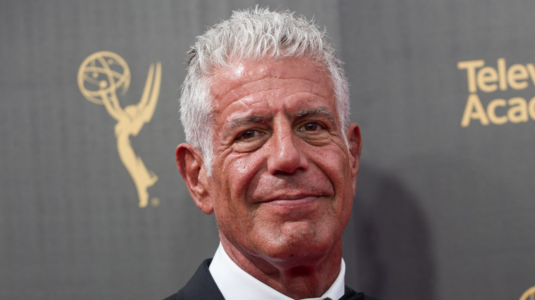 Anthony Bourdain smiling.
