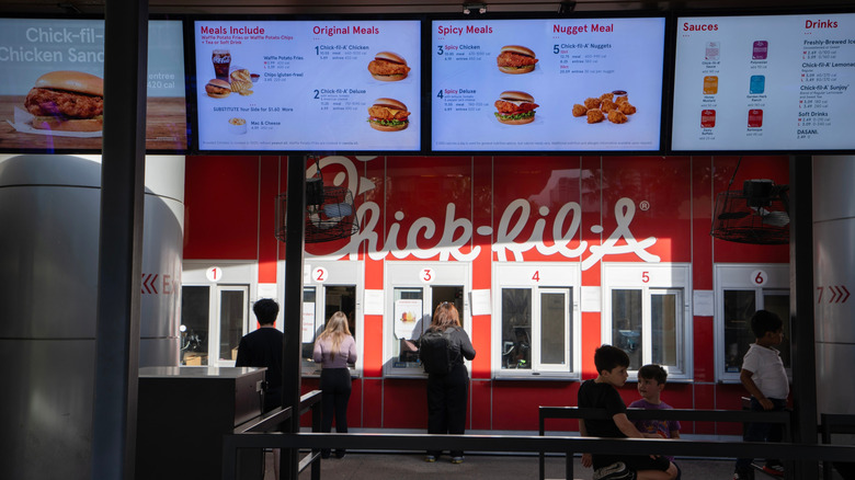 People order food at Chick-fil-A pickup window