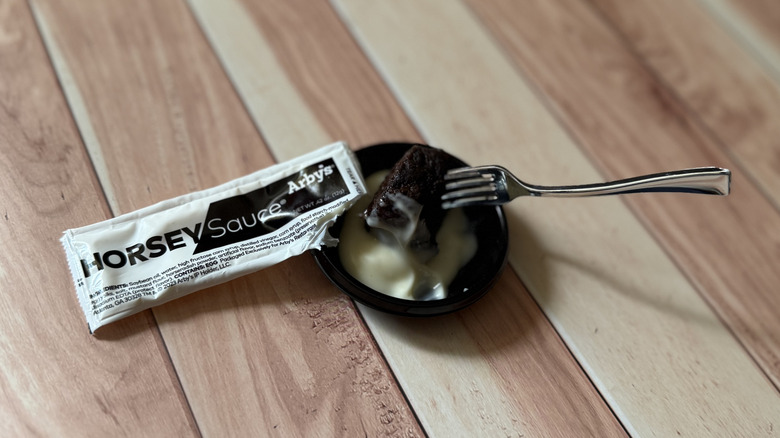 A Steak Nugget dipped in Horsey Sauce