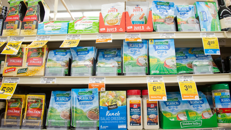 Assorted ranch dressing seasoning mixes on grocery store shelf