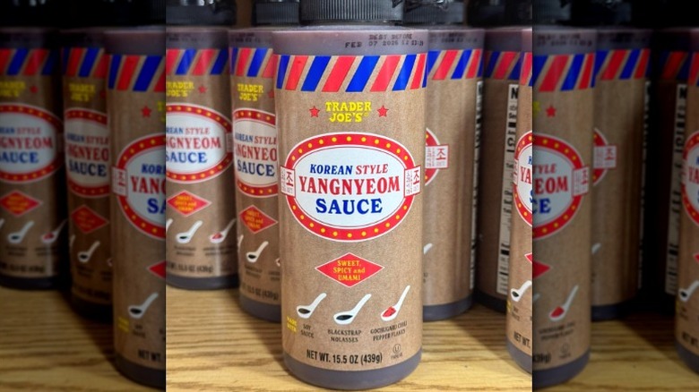 Bottles of Trader Joe's Yangnyeom Sauce on a shelf.