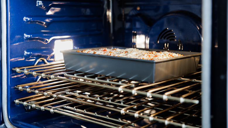 Lasagna baking in oven