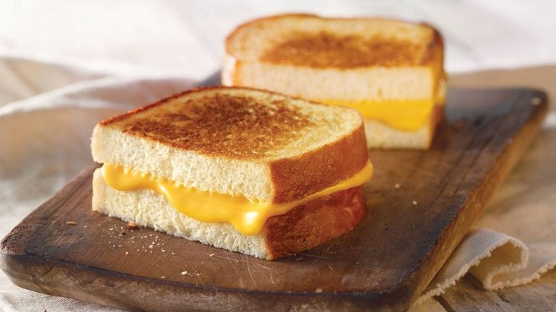 Panera Bread grilled cheese sandwich on a wood board