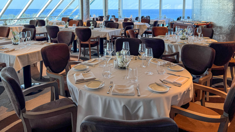 Cruise ship dining room with tables ready for diners