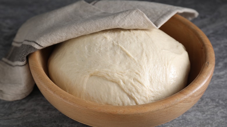 Dough rising in a bowl