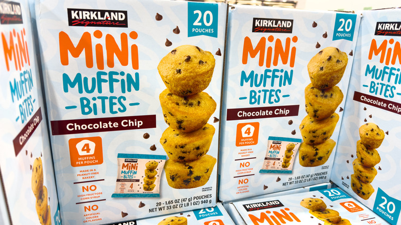 Boxes of Kirkland Signature Mini Muffin Bites on display at Costco