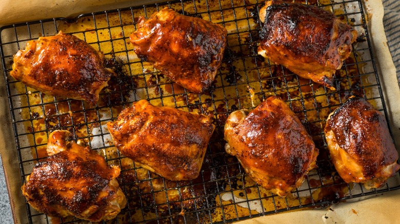 Baked BBQ chicken on wire rack
