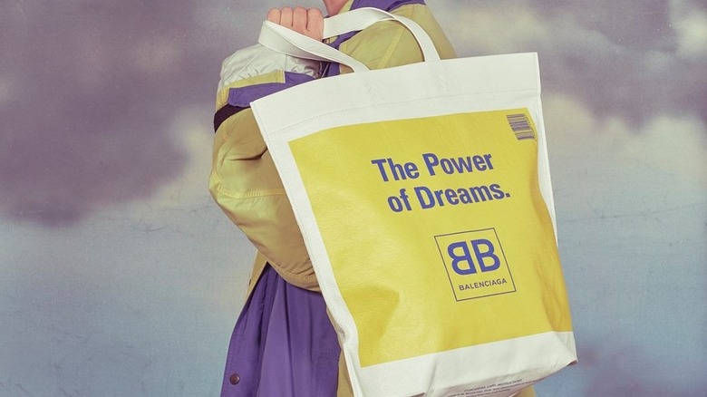 A yellow shopping tote from a 2018 Balenciaga campaign