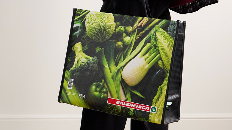 A yellow shopping tote from a 2018 Balenciaga campaign