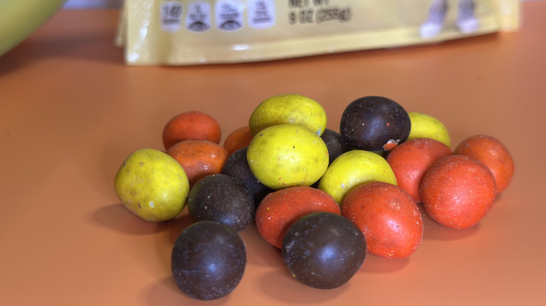 Close up of M&Ms Banana Nut Bread individual candies in a pile on counter