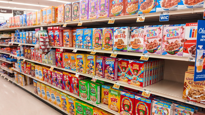 Aisle of cereal boxes in grocery store